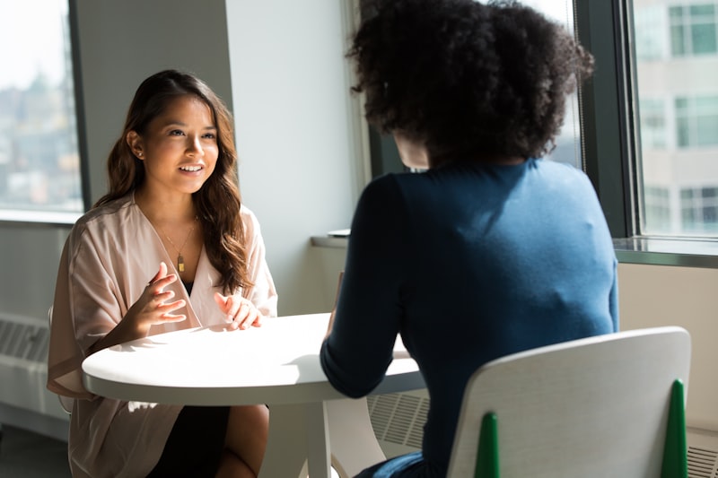 Counselor listening to client during a trauma-informed narrative session